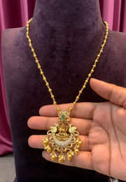 Beautiful one line chandraharam short chain with God laxmi motive locket and guttapusalu hangings
